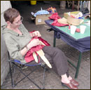 Valerie Hancorn, a kite-maker, making the tail.