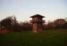 ..which paints the tower in a bloodred light.