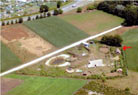 The farm and its buildings from the air..