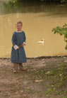 A Batavian child seems to be playing...