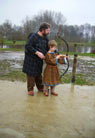 Jean teaches Jeroen the secrets of the bow.