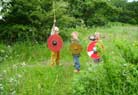 For the kids, the day was one big adventure of playing soldiers in the woods.