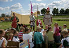 The Romans show the Gallic chuildren about the Roman Empire..