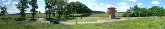A 180-degree panoramic spread facing west.