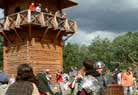 Under the watchful eyes of the amused public, they are dragged off to the fort for questioning.