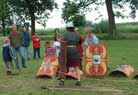 Sander of Leg. X Gemina teaching the kids basic fighting techniques.