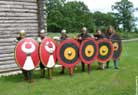 Combined arms of the Fectienses and the Minervii in a shield wall.