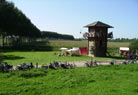 The vicus in the sun, and the bicycles of the visitors that have begun to arrive.