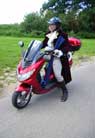 .. and his motorised transport!