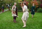 Martin sparring with Mante, her brother Tycho looks on..