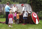 The kids come round, attracted by all the shiny armour and colourful stuff..