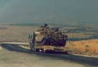 We were on our way to the Golan Heights.. and so were they. The Israeli Defence Force bringing up reserve armour. 