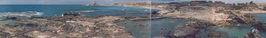 Spread showing the city from the south. Standing on Herod's palace, to the right is the amphitheatre, down the middle the as yet unexacvated Hippodrome, and at the horizon the Crusader dungeon, built on top of the remains of Herod's southern breakwater.