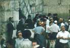 Prayers at the Western Wall after the start of the shabbat.