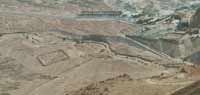 Spread showing camps C (left), B (middle) and A (right) as seen from the top of the plateau, with the siege wall in front of them.