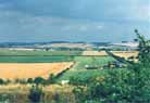 Looking east, with the Roman road to Winchester coming in from the right.