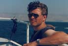 Menno adding to his tan on a boat - not much else to do in Tiberias.